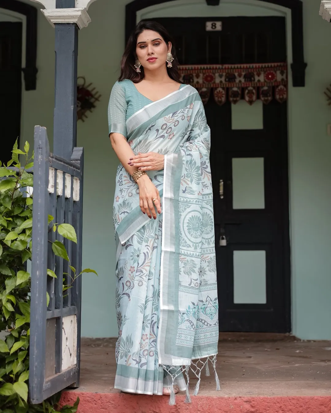 Pastel Green Pure Linen Printed Saree with Tassels