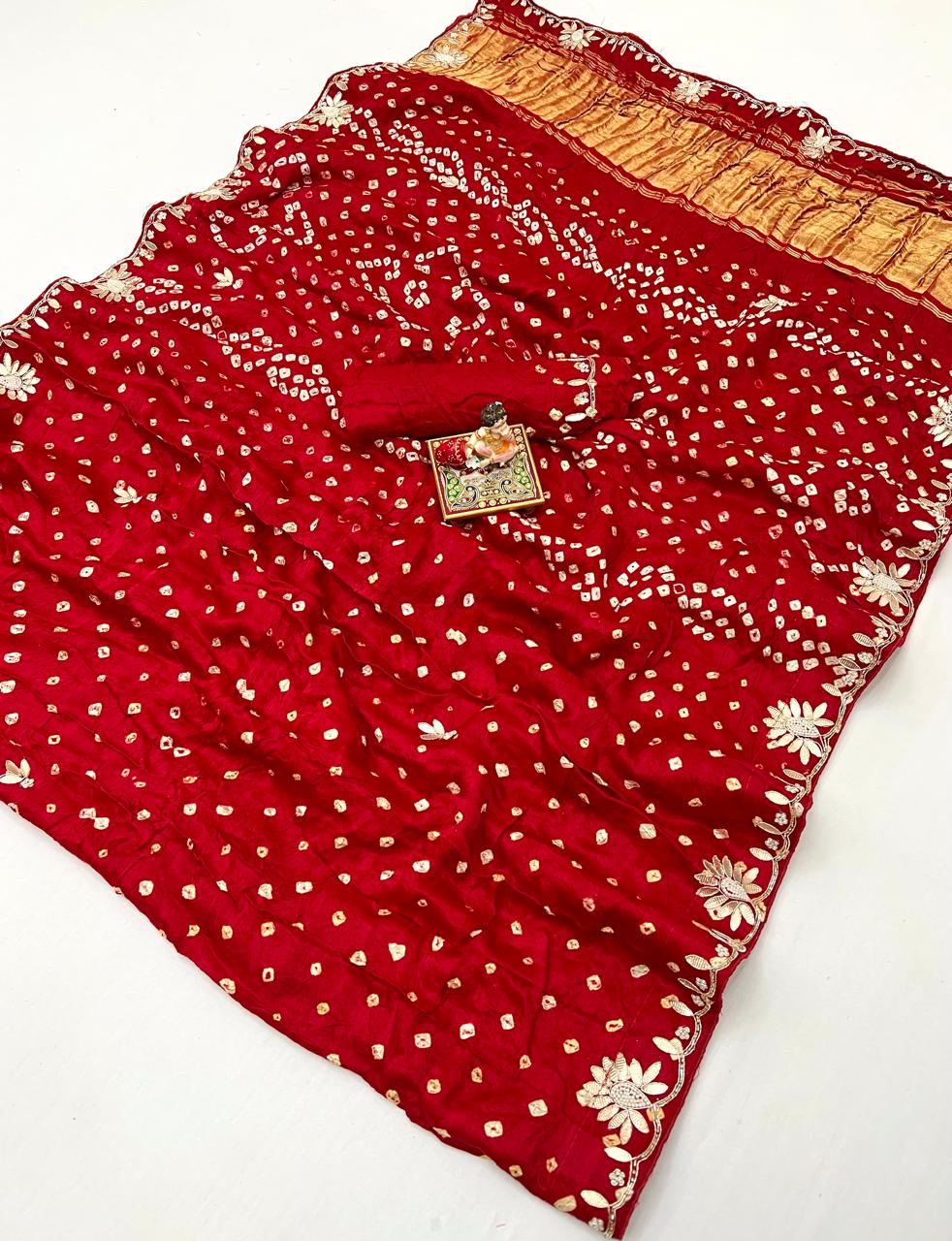 Red silk saree with bandhani