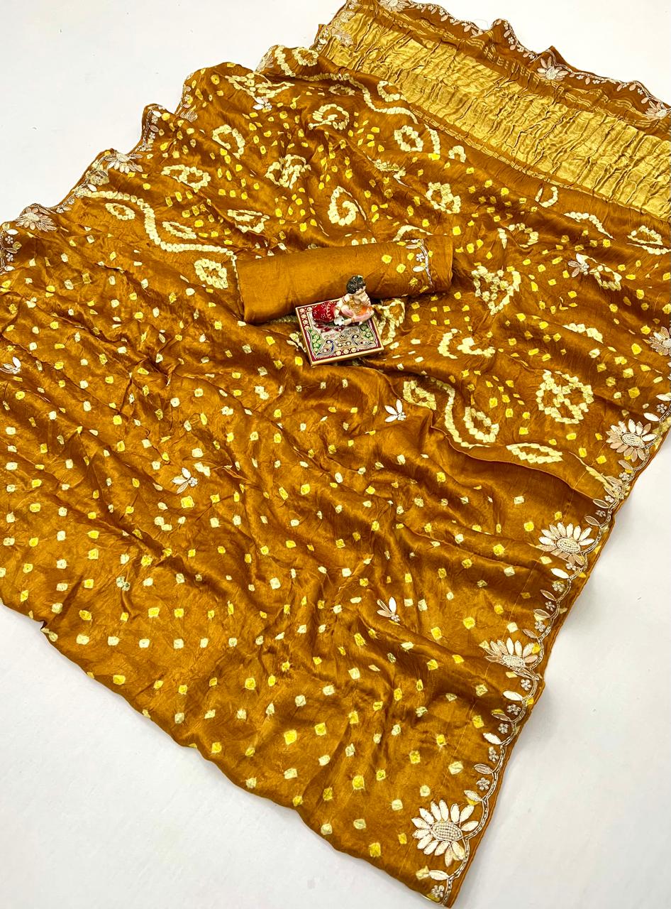 Mustard silk saree with bandhani for wedding
