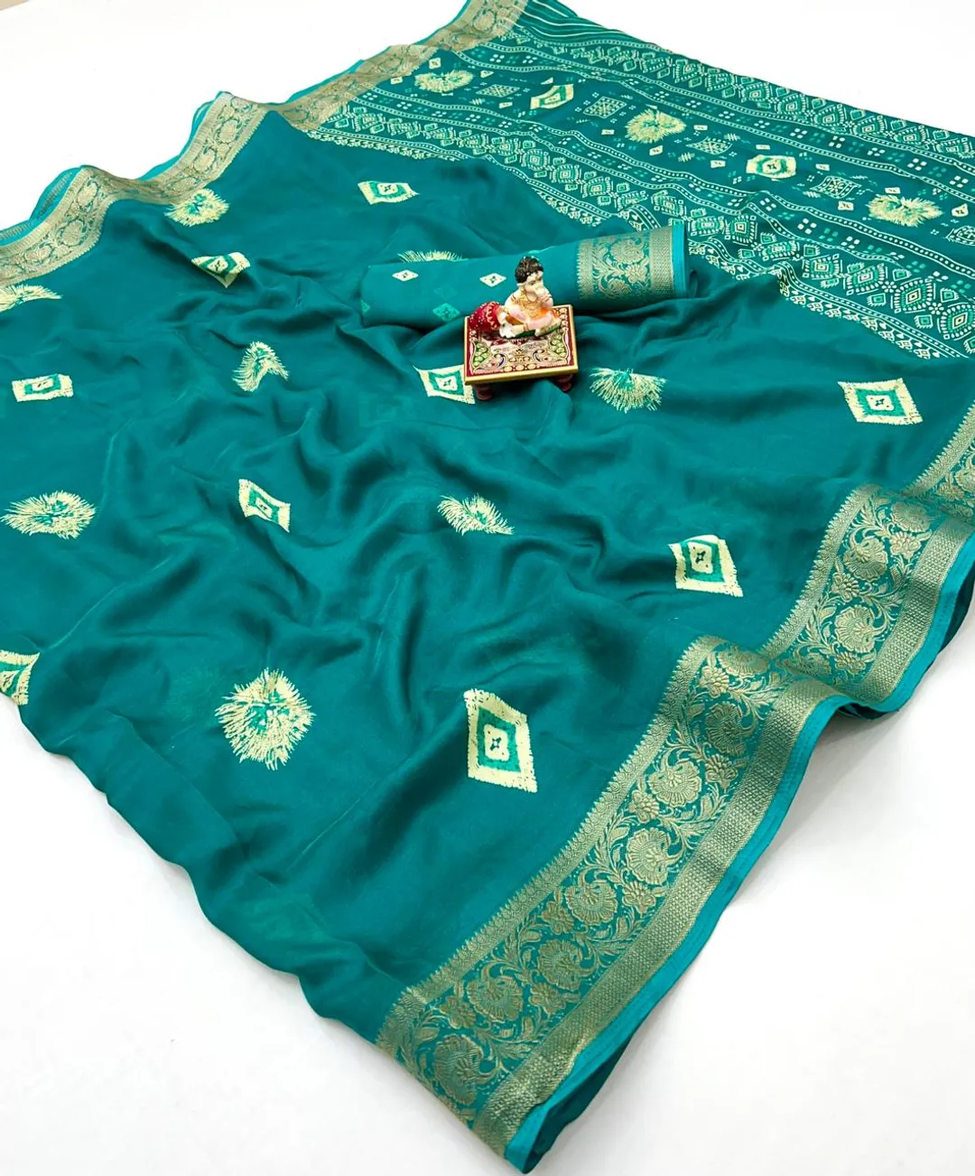 Teal Moss Mellow Georgette Zari Border Saree