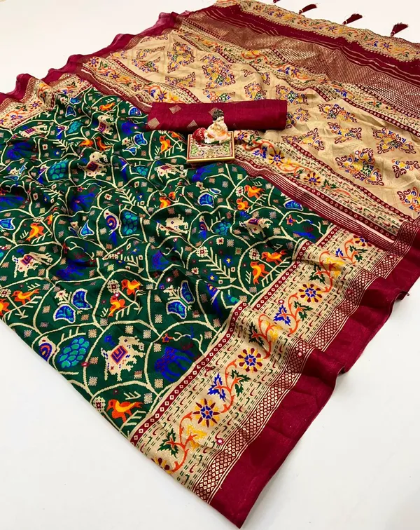 Traditional Bottle Green Patola Border Silk Saree