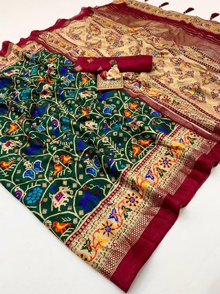 Traditional Bottle Green Patola Border Silk Saree
