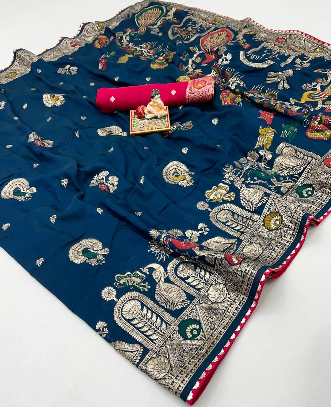 Designer Teal Blue Maslin Silk Saree With Woven Blouse