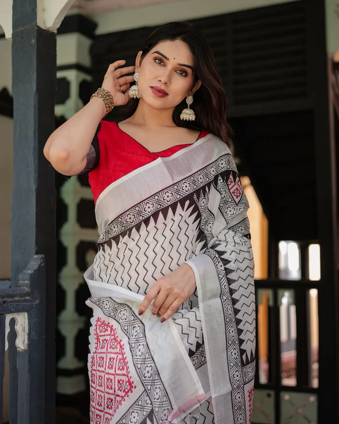 Monochrome Magic Linen Saree with Bold Red Touch