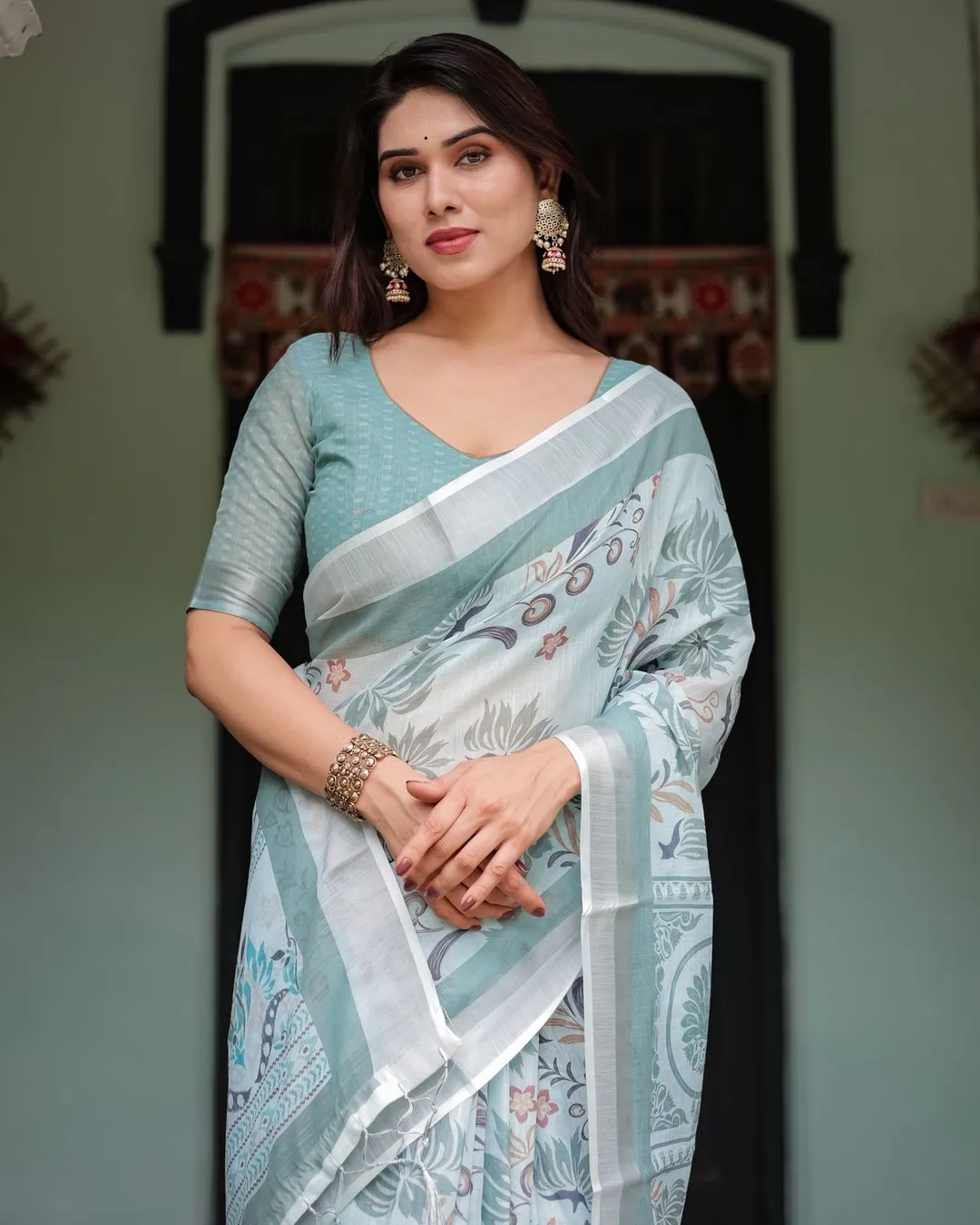 Pastel Green Linen Saree with Elegant Floral Print