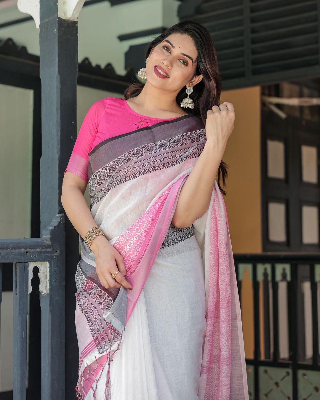Elegant White Linen Saree with Bold Pink Designer Border
