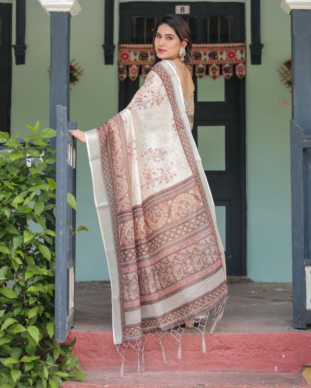 Graceful Beige Linen Saree with Traditional Designer Border