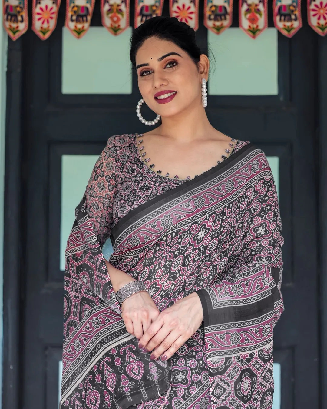 Elegant Black Ajrakh Linen Saree with Pink