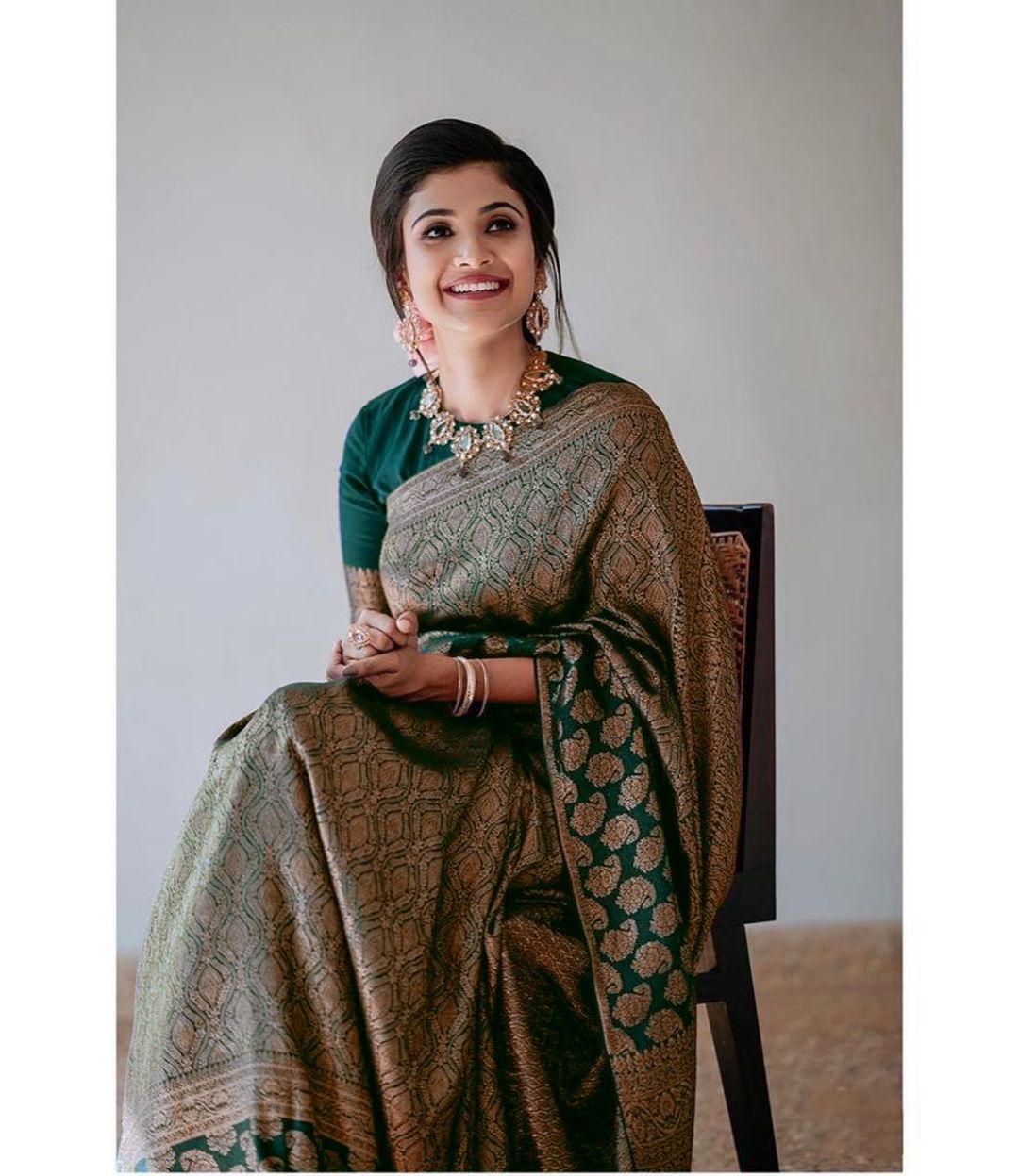 Dark Green Lichi Silk Saree with Rich Golden Jacquard