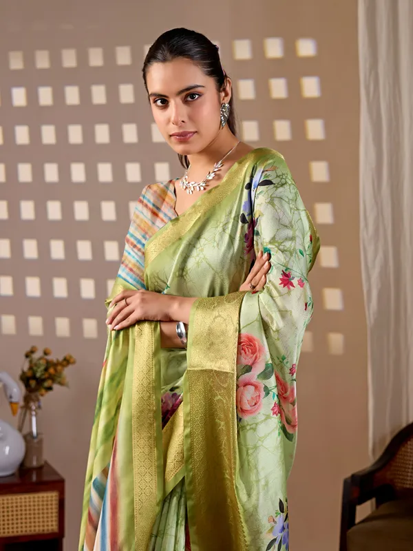 Elegant Green Floral Silk Saree with Golden Zari Border