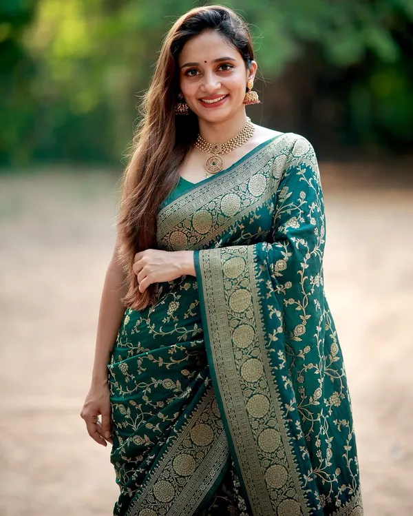 Wedding Wear Green Saree with Elegant Zari Finish