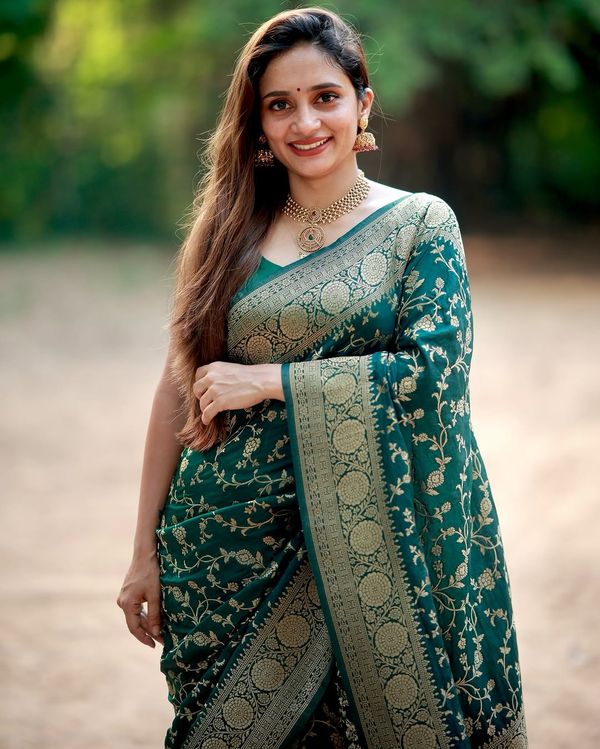 Wedding Wear Green Saree with Elegant Zari Finish