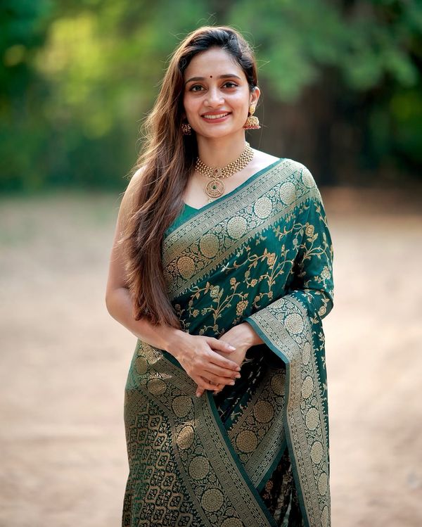 Wedding Wear Green Saree with Elegant Zari Finish
