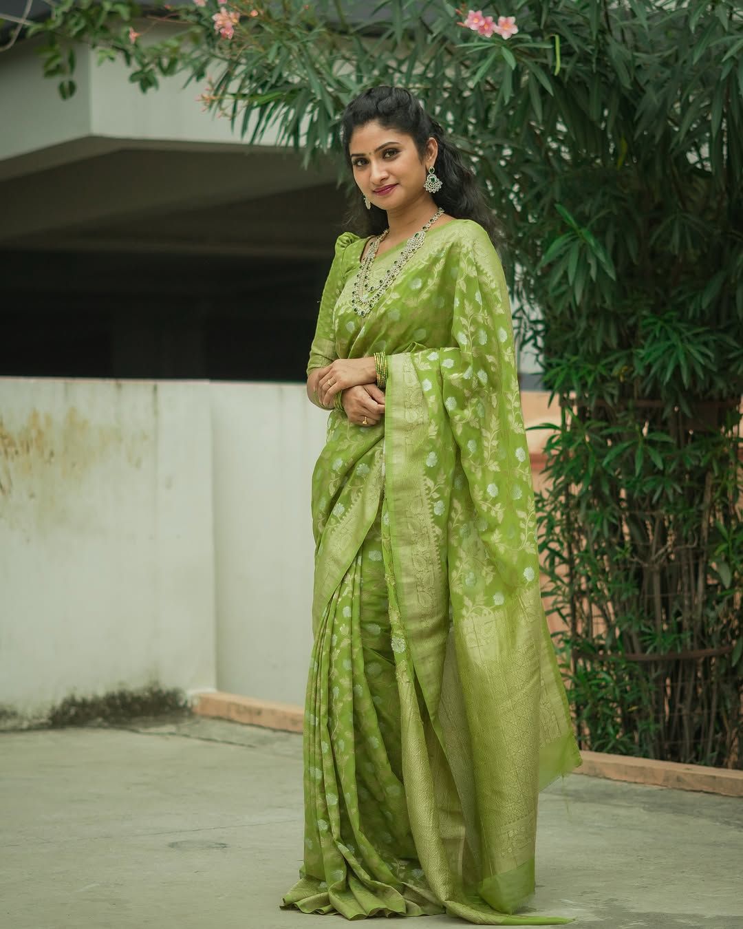 Festive Green Banarasi Saree with Subtle Zari Motifs