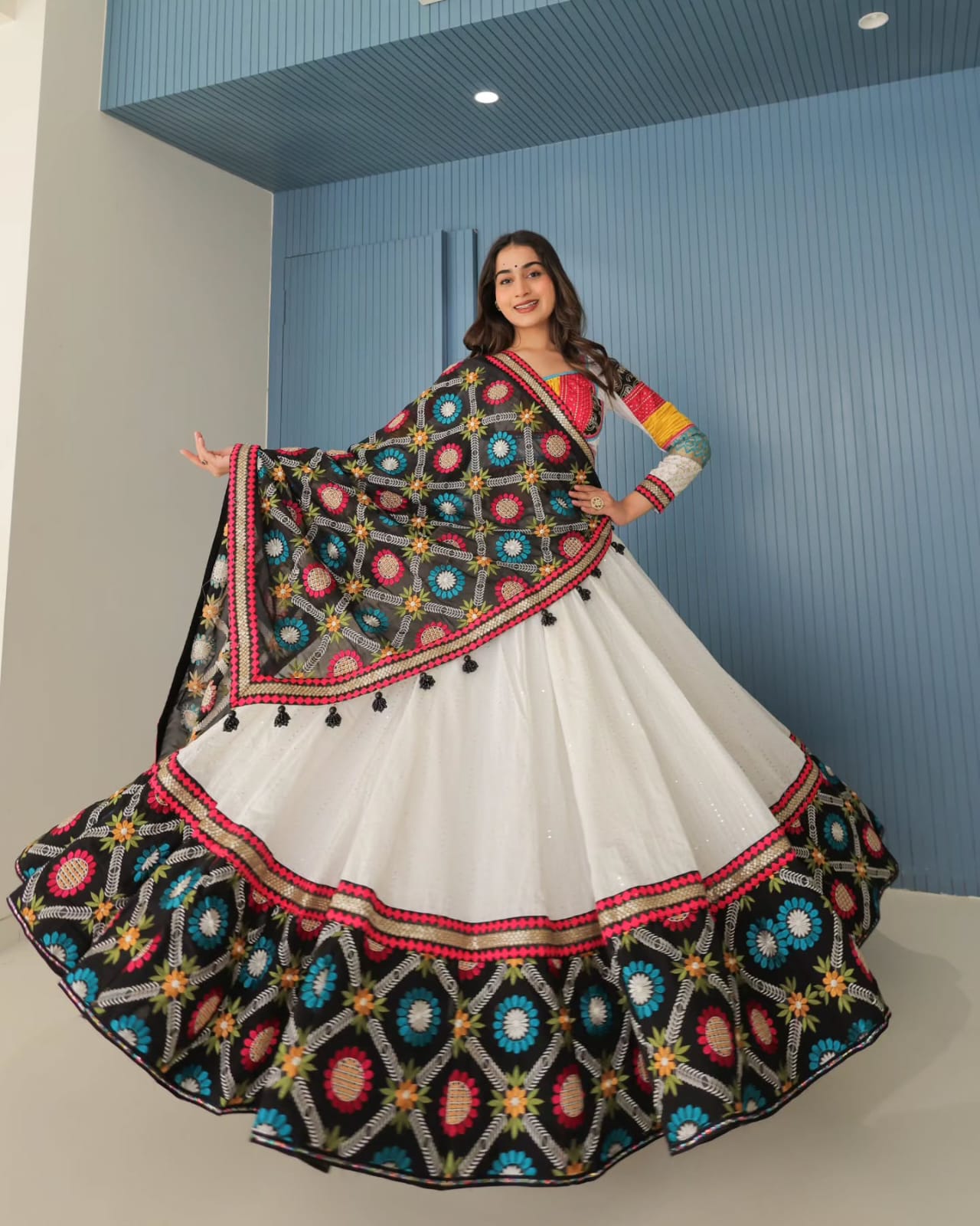White lehenga with mirror work for festive
