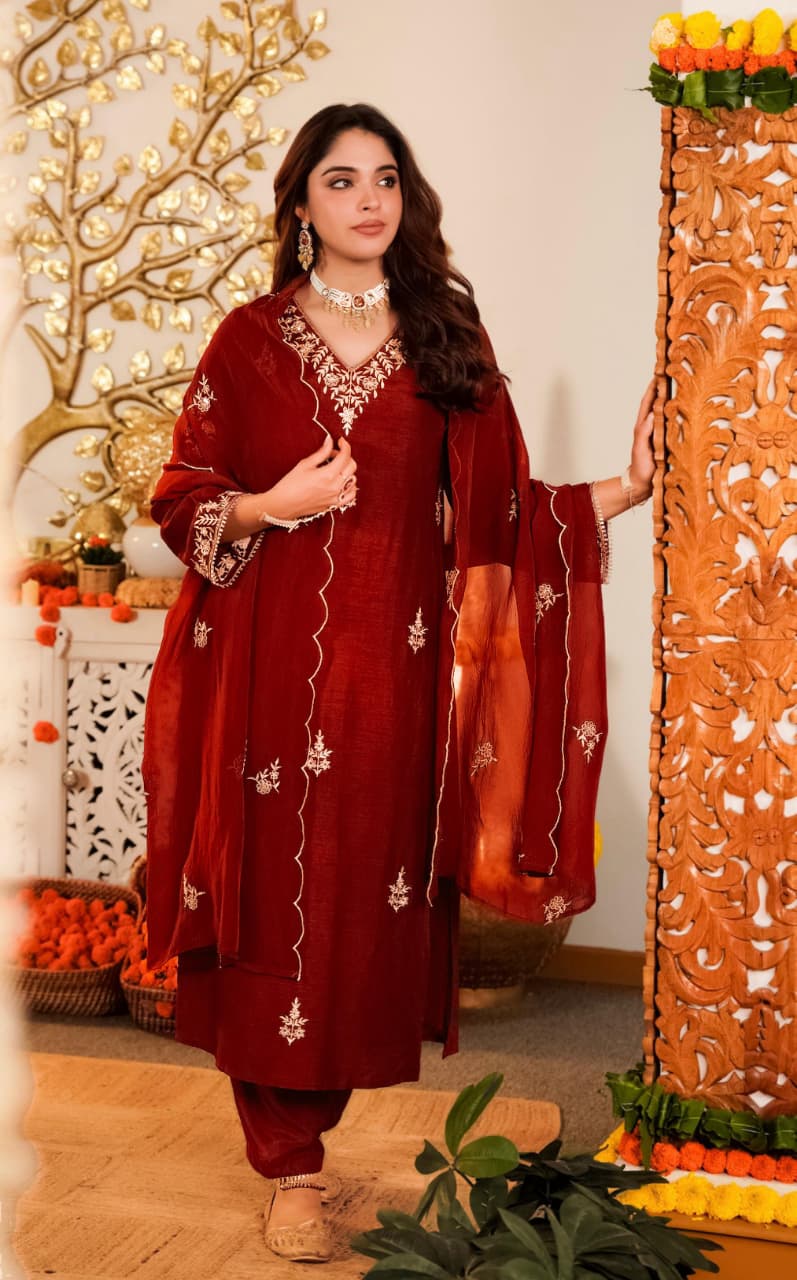 Embroidered red silk salwar suit