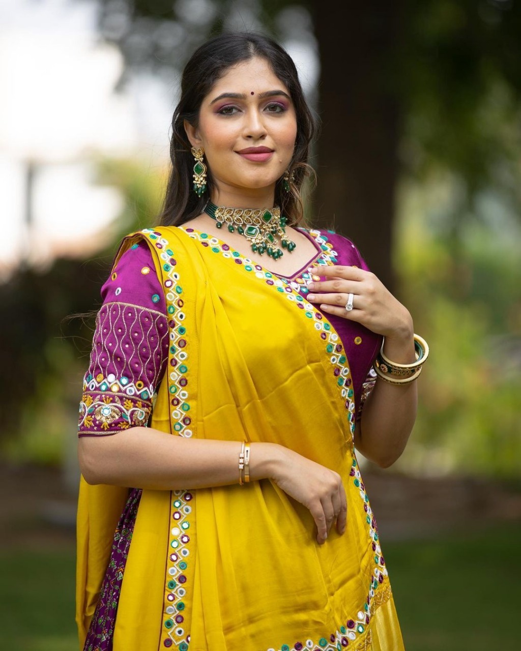 Yellow silk lehenga with mirror work