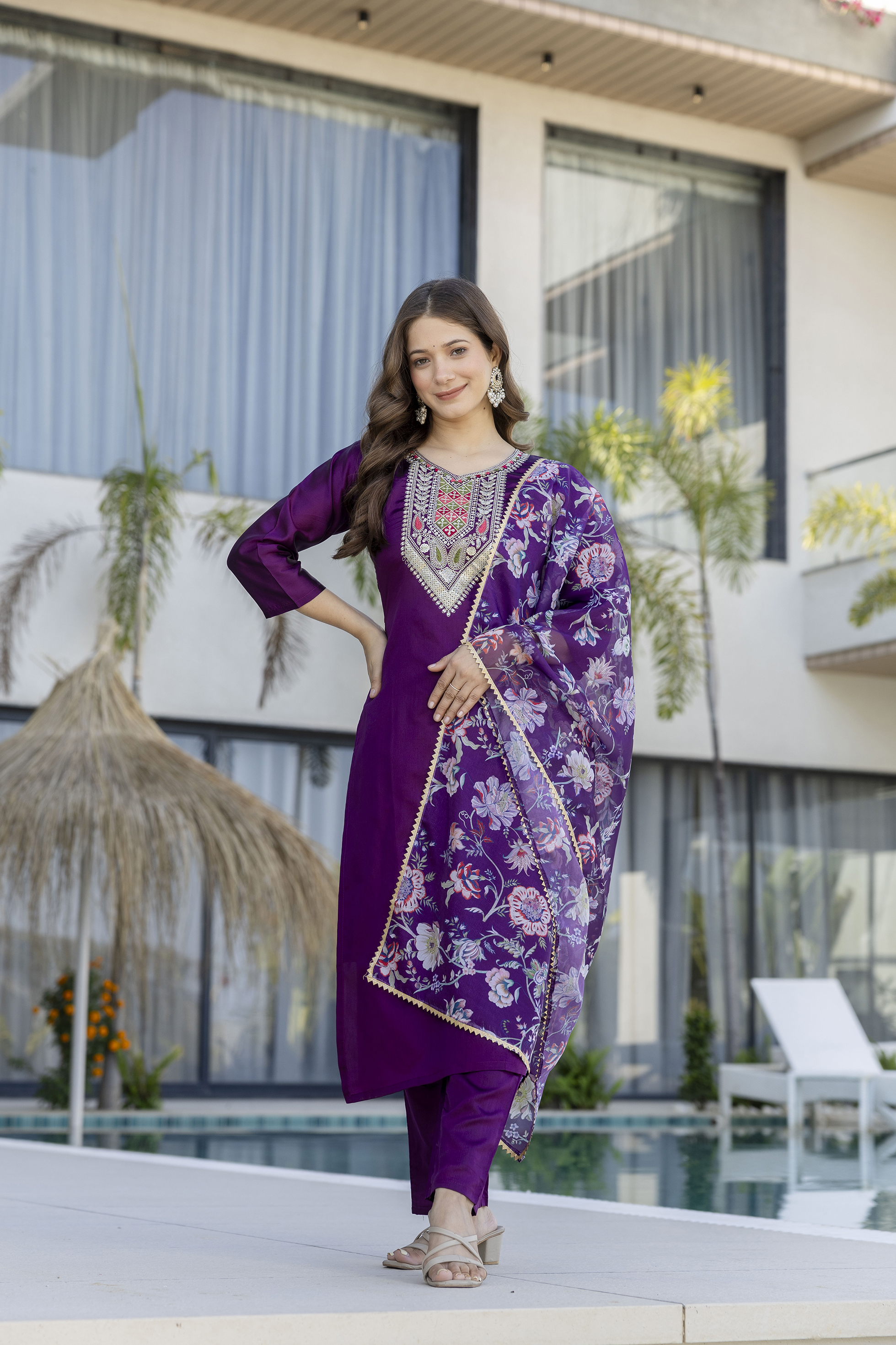 Embroidered red salwar suit for puja