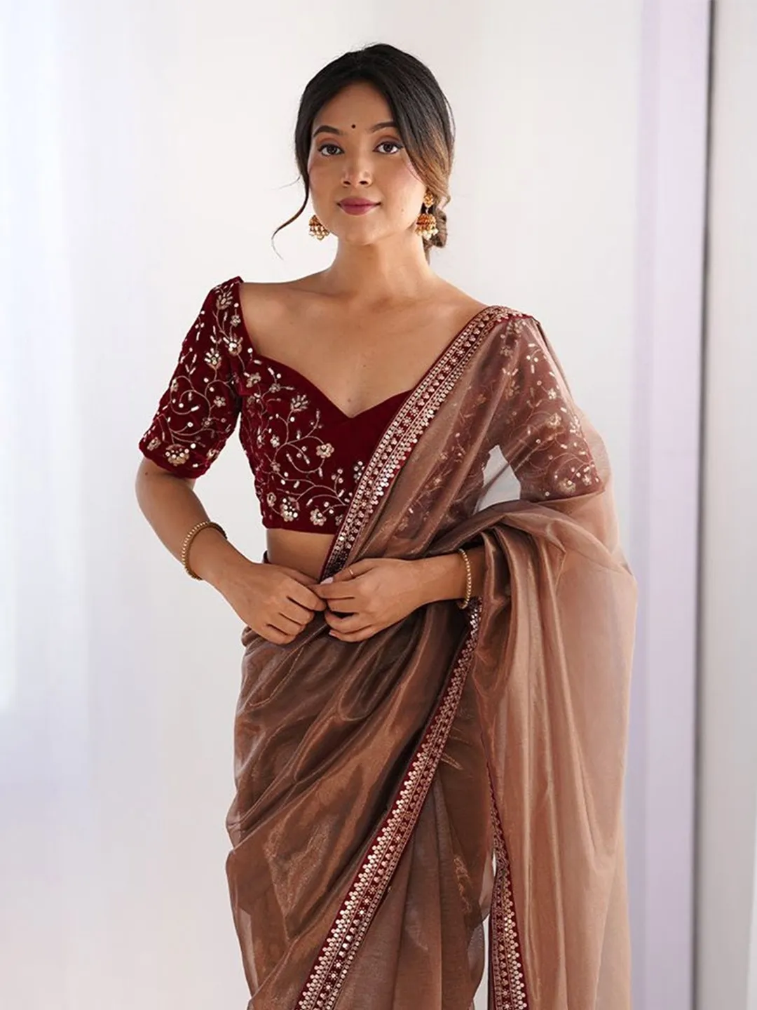 Elegant Brown Net Saree with Embroidered Blouse