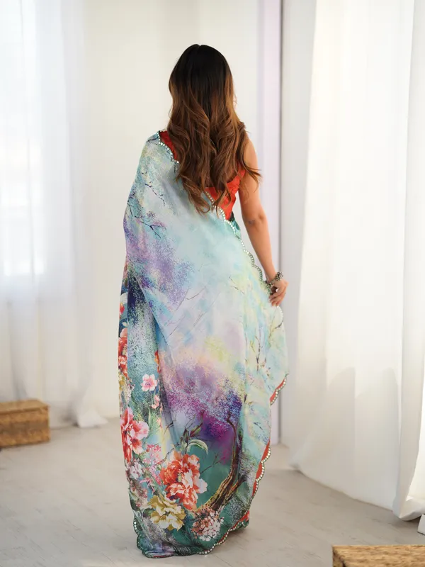 Elegant Aqua Blue Floral Saree with Mirror Lace