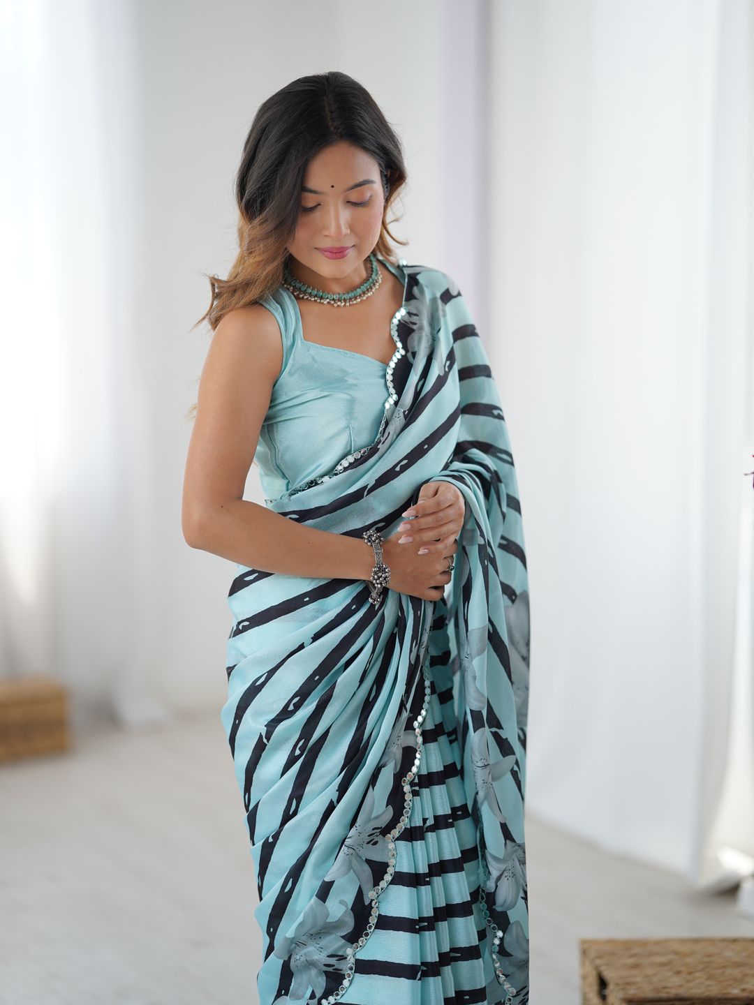 Sky Blue Floral Printed Chinnon Saree