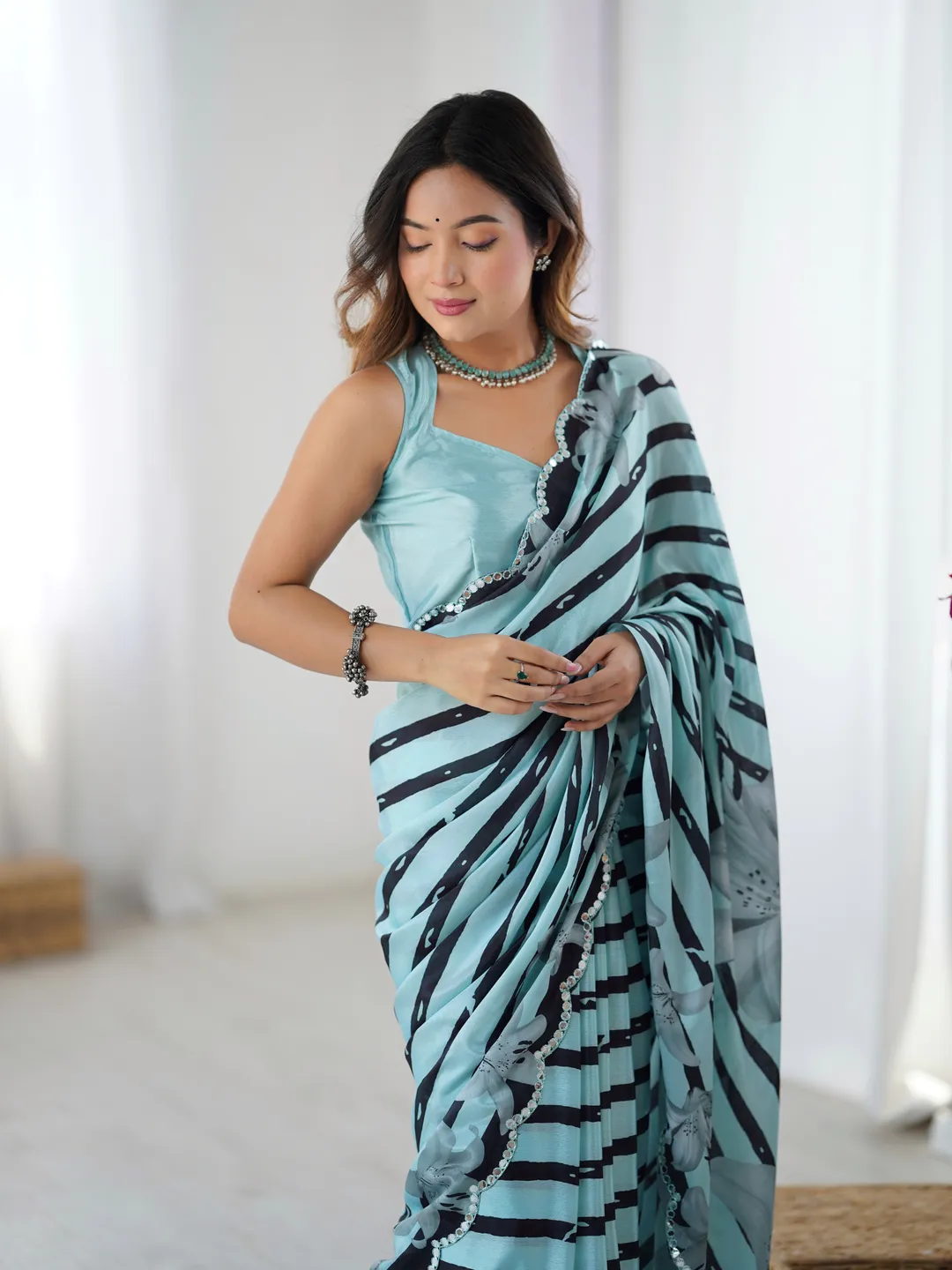 Sky Blue Floral Printed Chinnon Saree