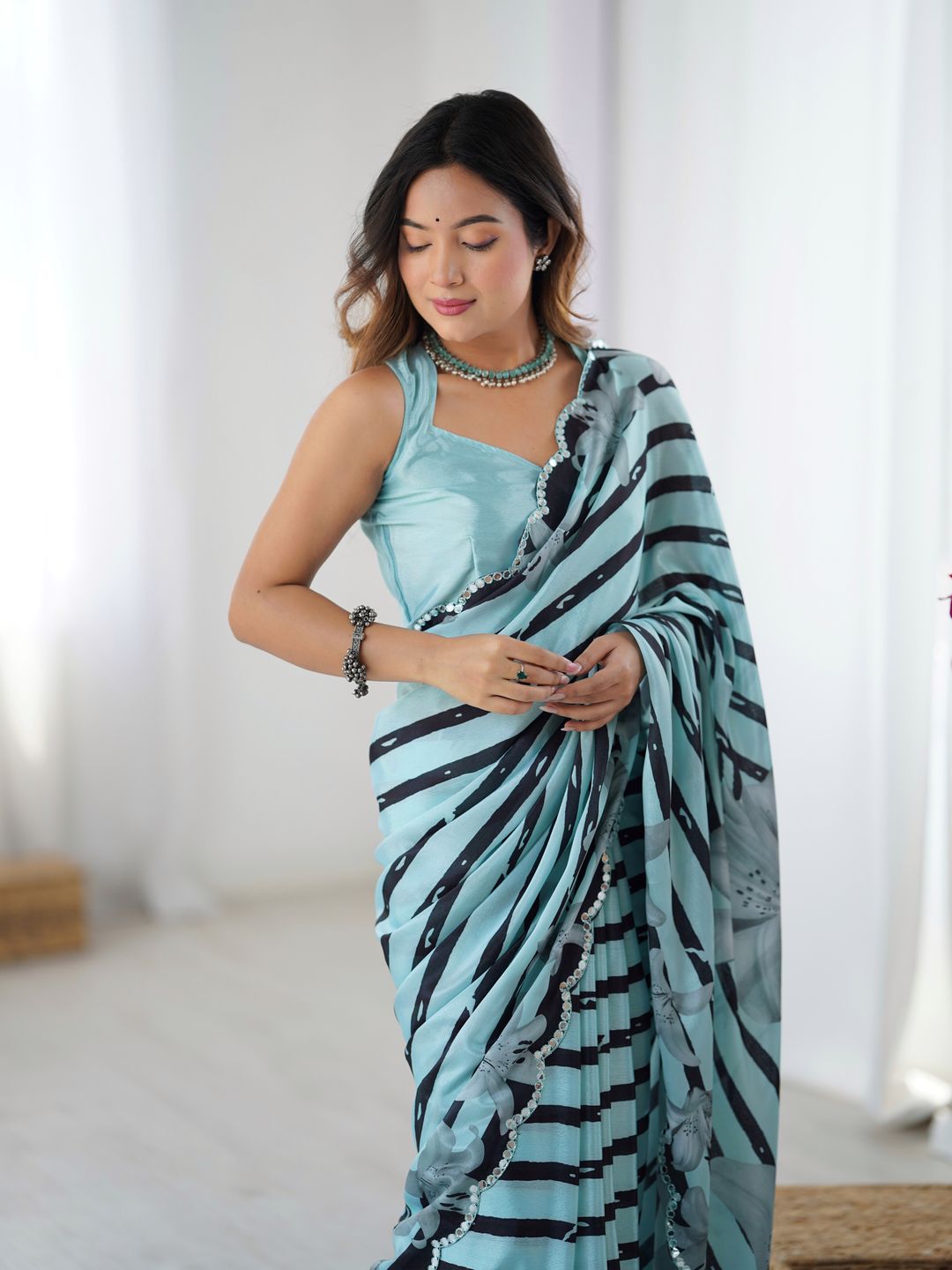 Sky Blue Floral Printed Chinnon Saree