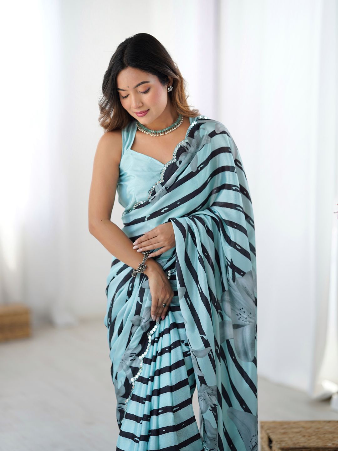 Sky Blue Floral Printed Chinnon Saree
