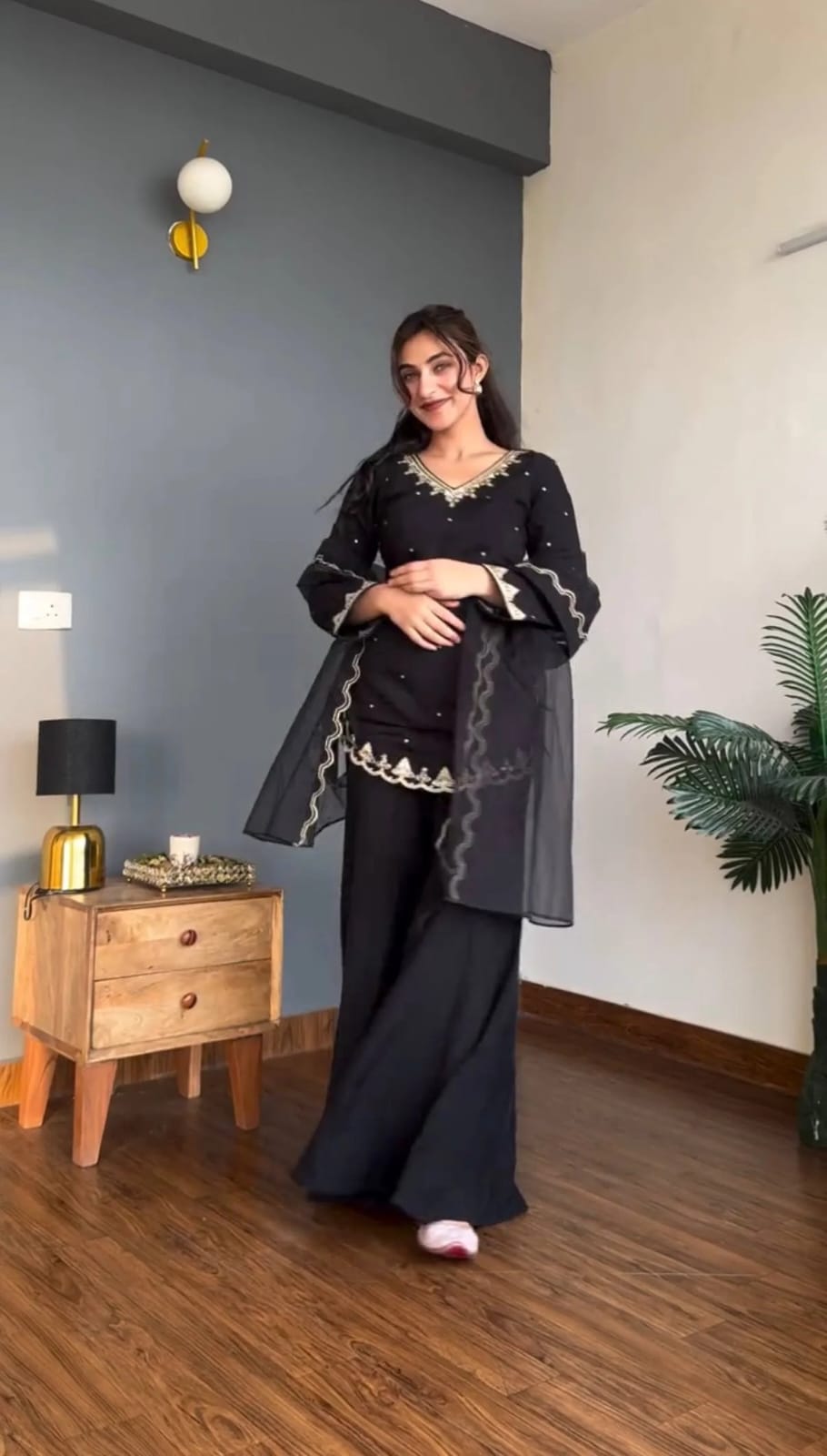 Black crepe salwar suit with embroidery
