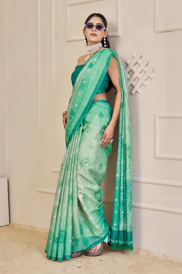 Sea Green Tissue Handloom Cotton Saree With Floral Patterns