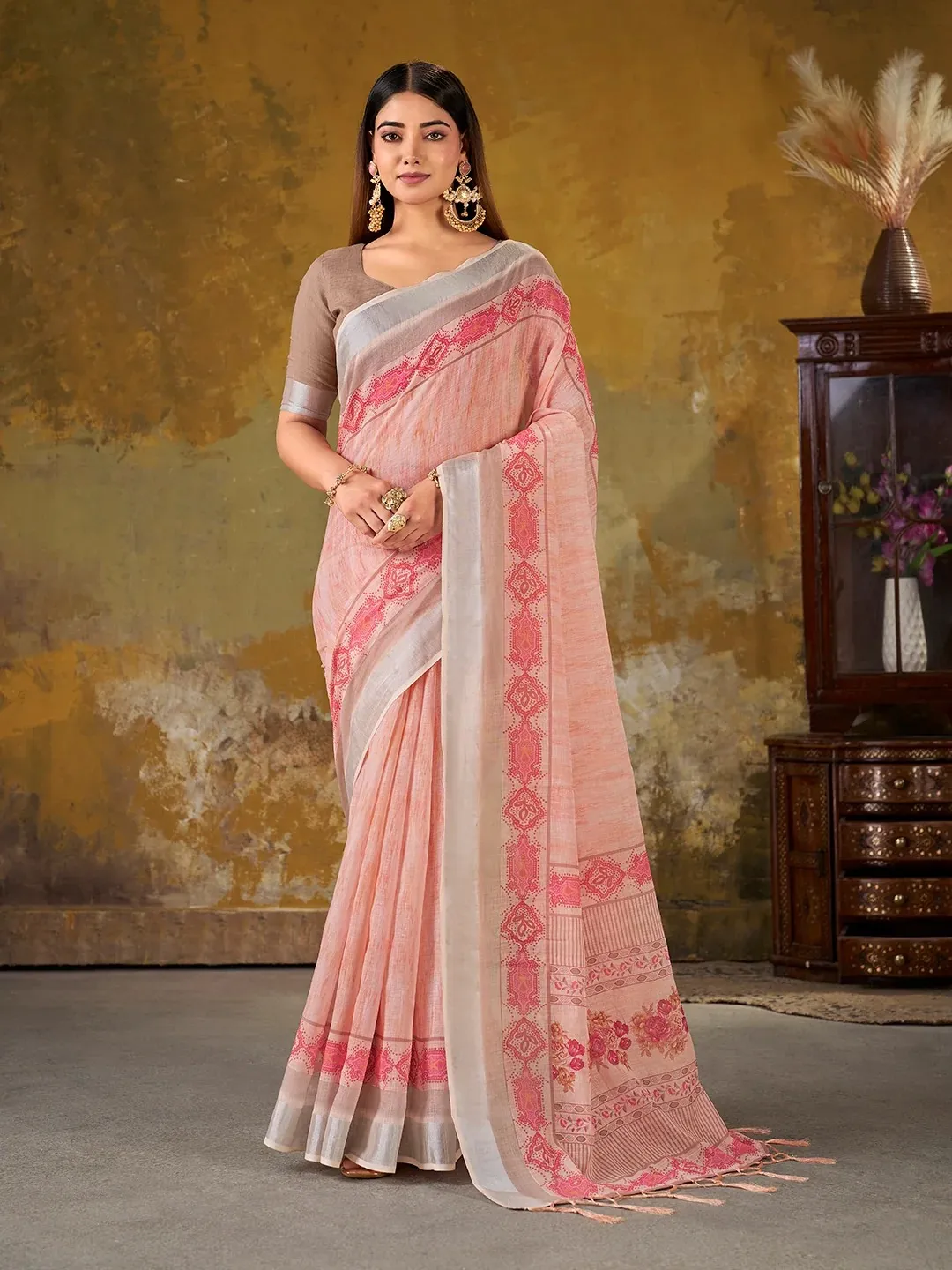 VARNAVI Peach Linen Cotton Floral Saree with Border Tassels