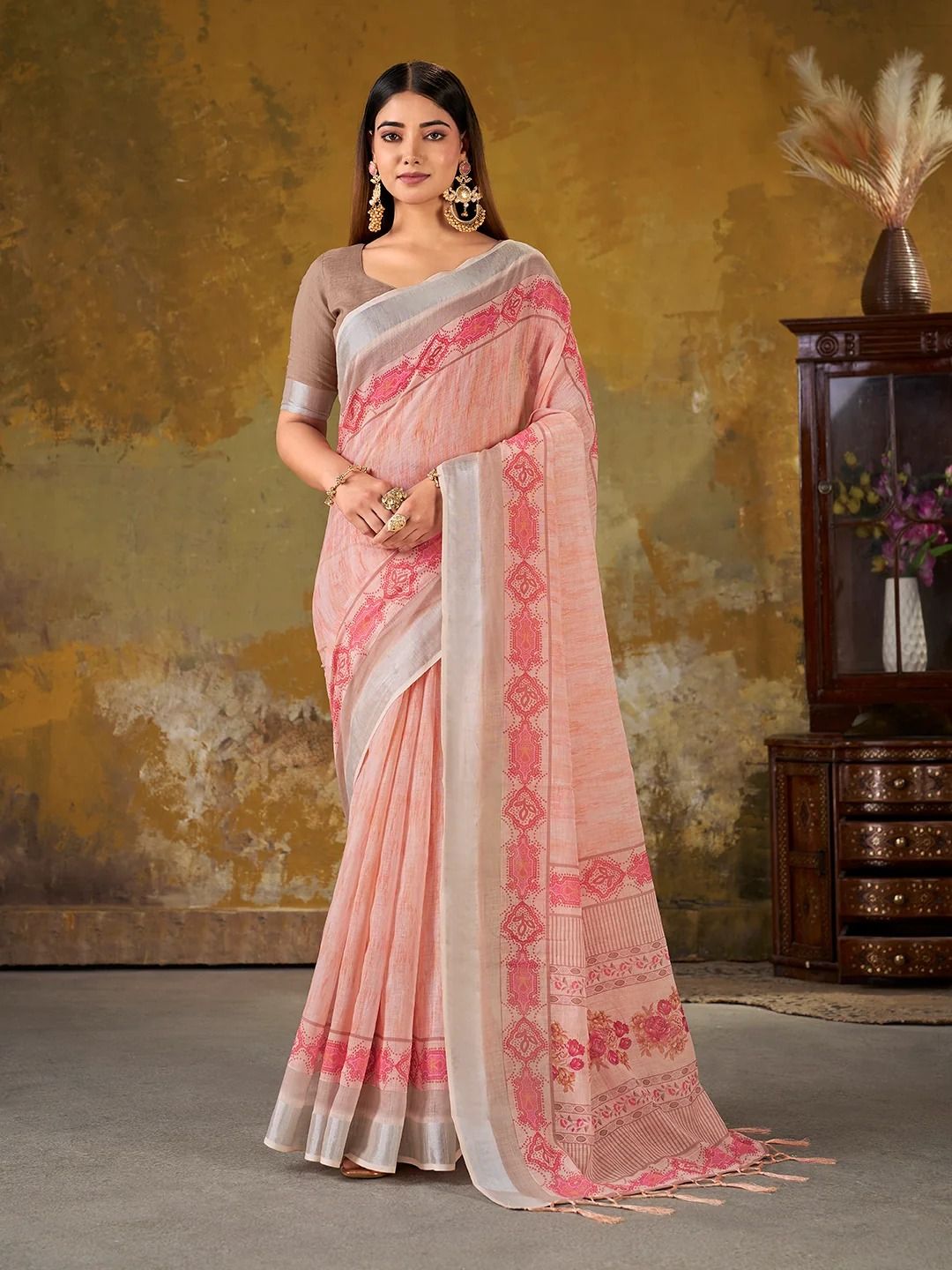 VARNAVI Peach Linen Cotton Floral Saree with Border Tassels