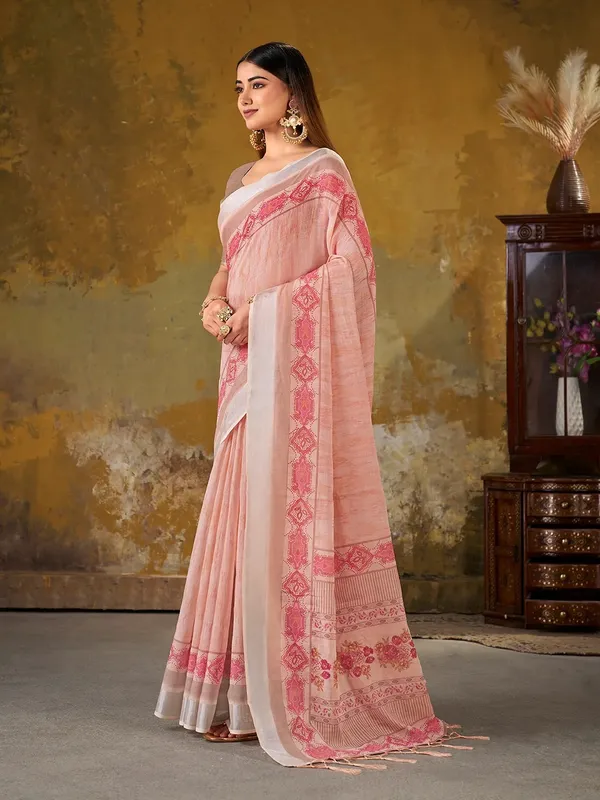 VARNAVI Peach Linen Cotton Floral Saree with Border Tassels