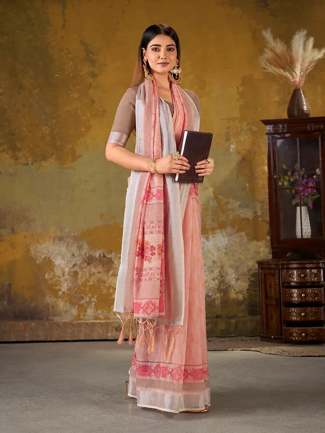 VARNAVI Peach Linen Cotton Floral Saree with Border Tassels