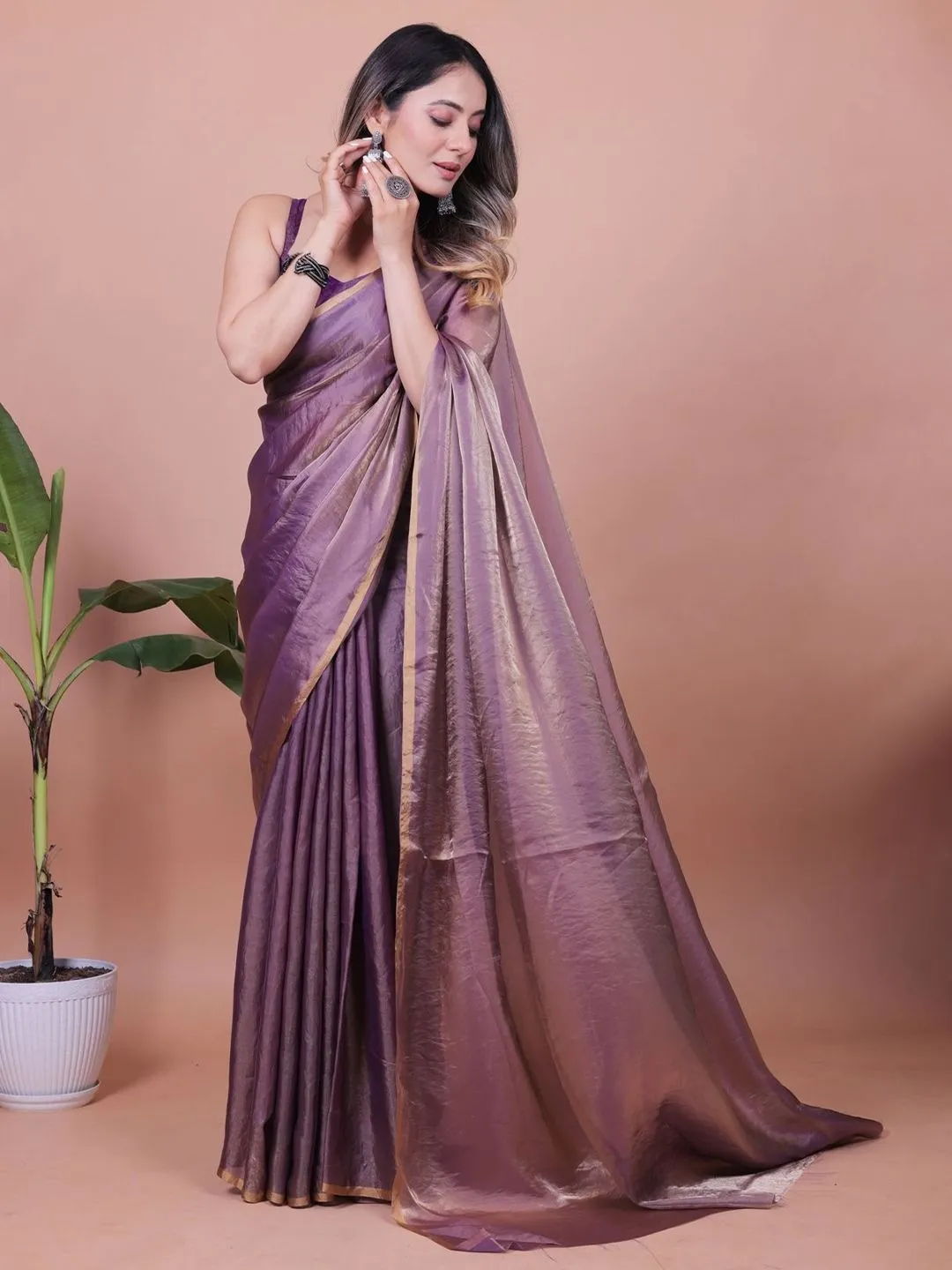 Purple Fandy Shimmer Solid Saree With Blouse by VARNAVI