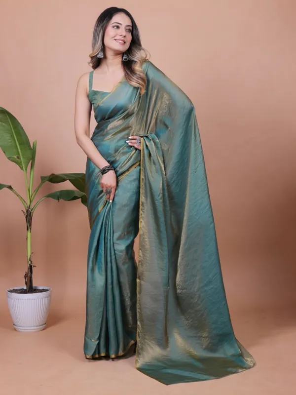 Teal Fandy Solid Saree With Blouse for Women by VARNAVI
