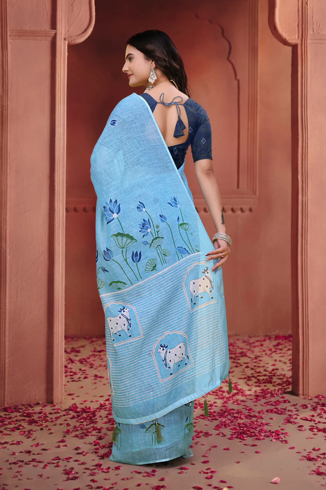 Sky Blue Linen Cotton Floral Sarees with Printed Cow Motifs
