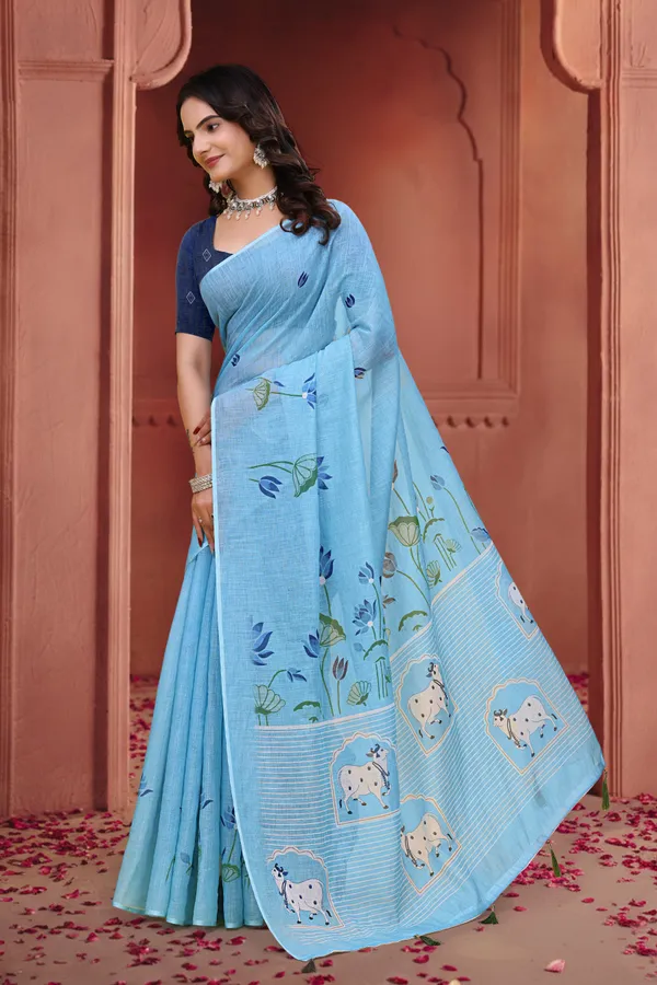 Sky Blue Linen Cotton Floral Sarees with Printed Cow Motifs