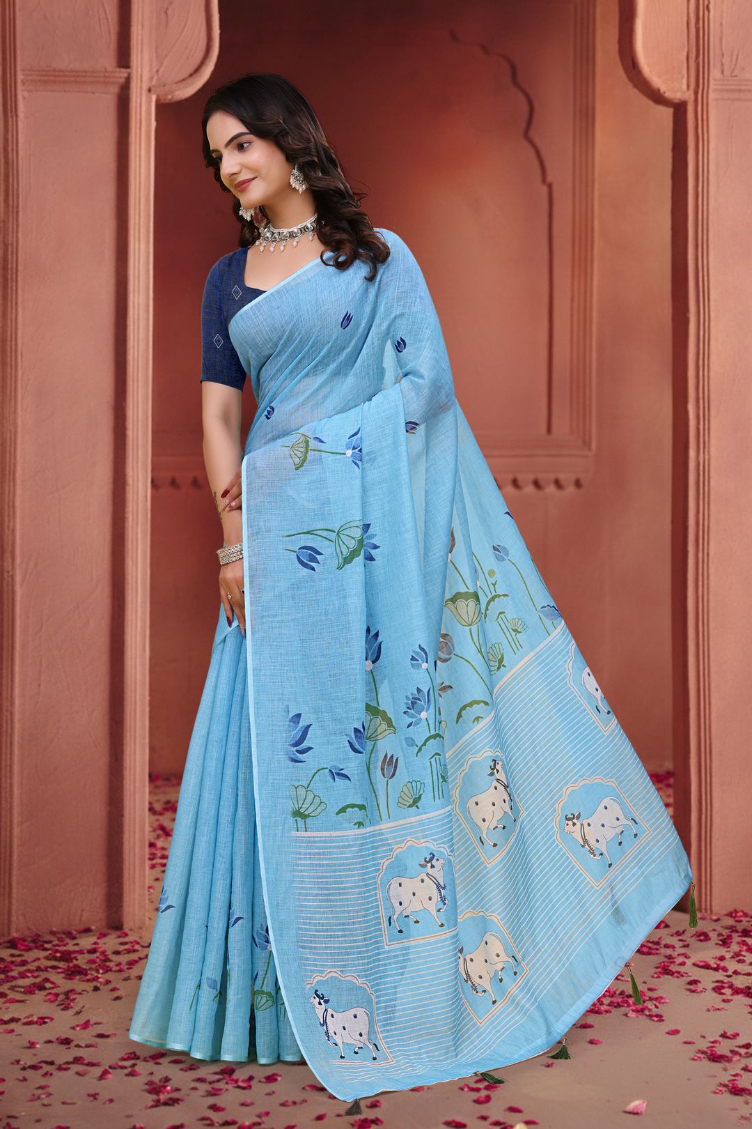 Sky Blue Linen Cotton Floral Sarees with Printed Cow Motifs