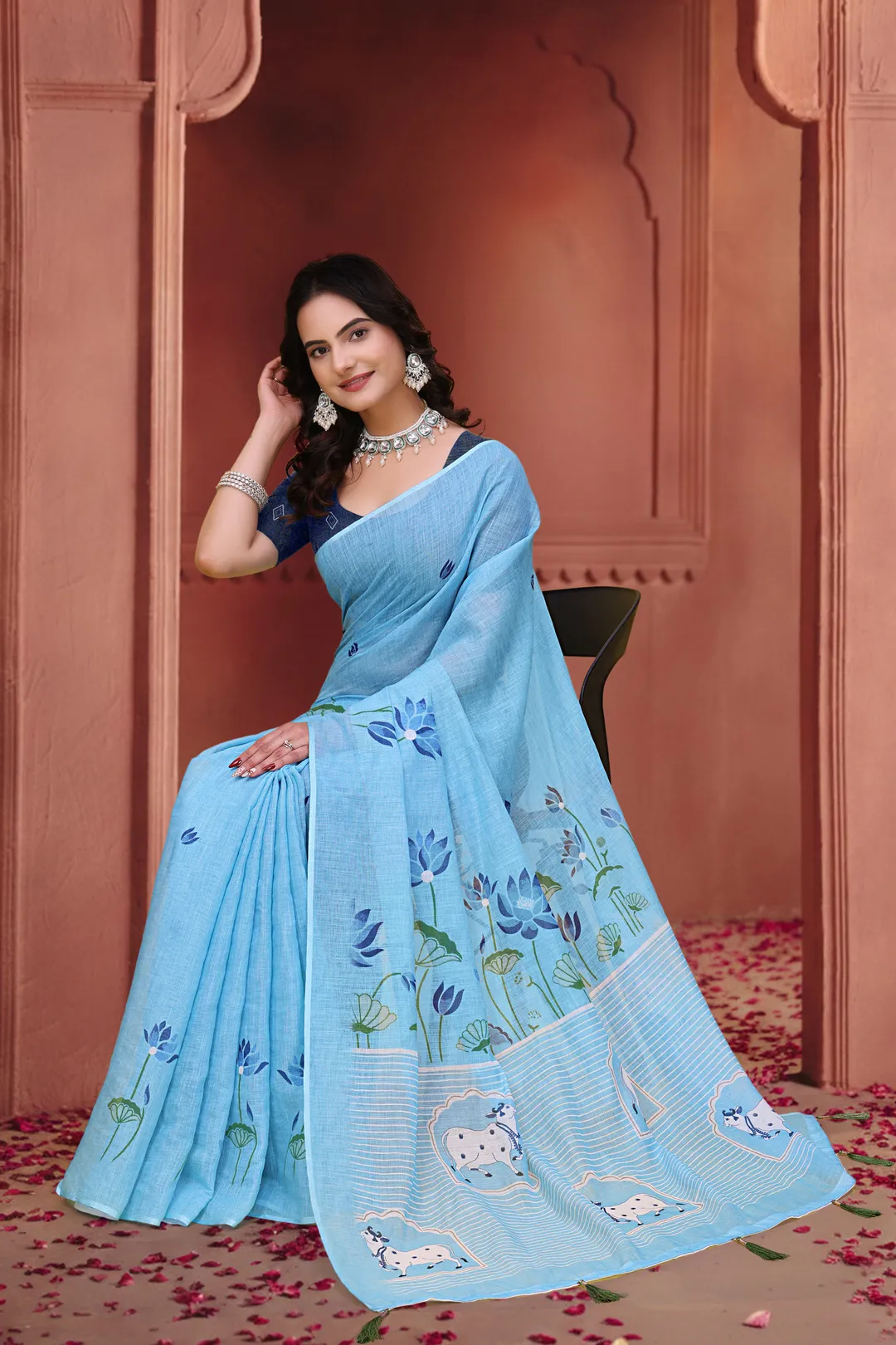 Sky Blue Linen Cotton Floral Sarees with Printed Cow Motifs
