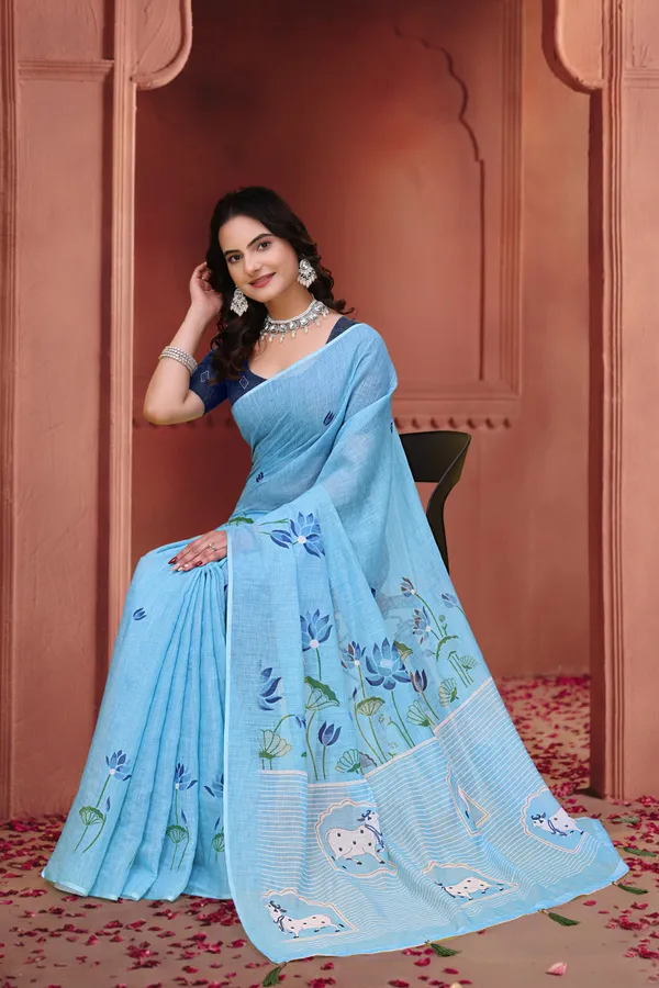 Sky Blue Linen Cotton Floral Sarees with Printed Cow Motifs