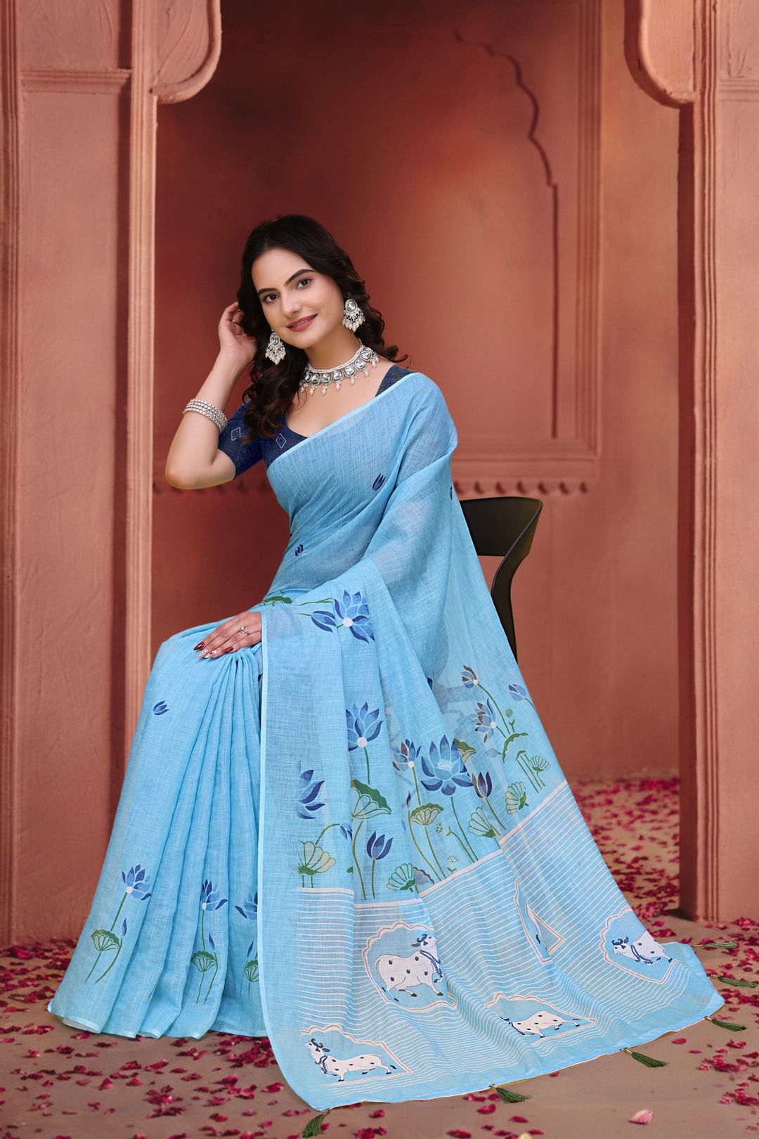 Sky Blue Linen Cotton Floral Sarees with Printed Cow Motifs