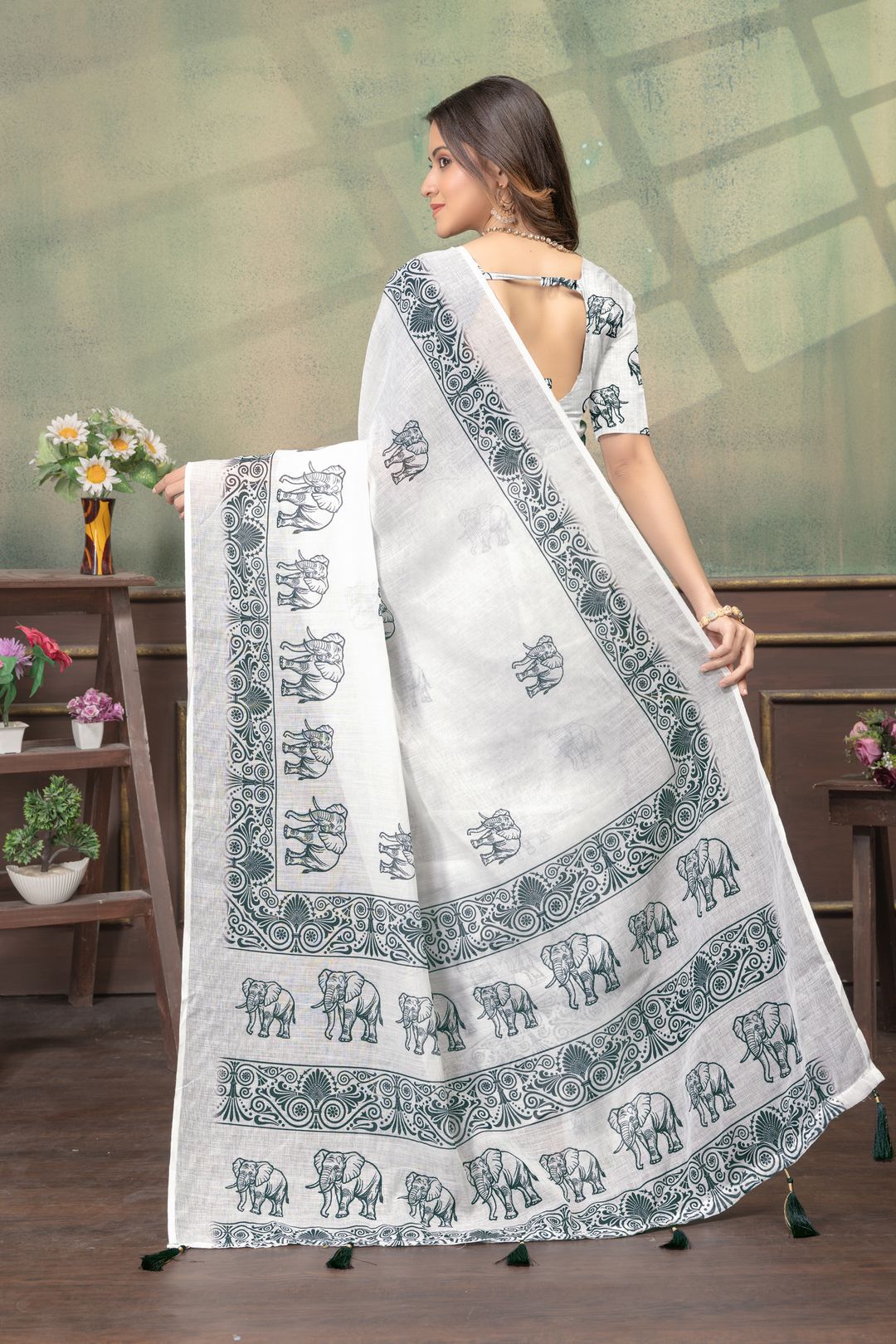 Ivory Linen Cotton Saree with Elephant Print Border Now