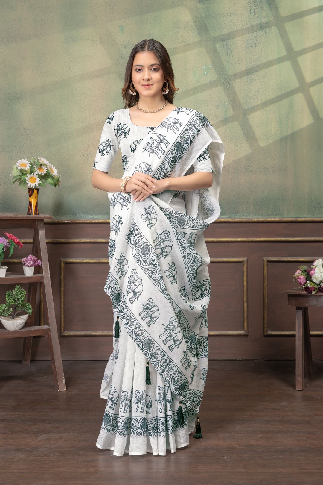 Ivory Linen Cotton Saree with Elephant Print Border Now