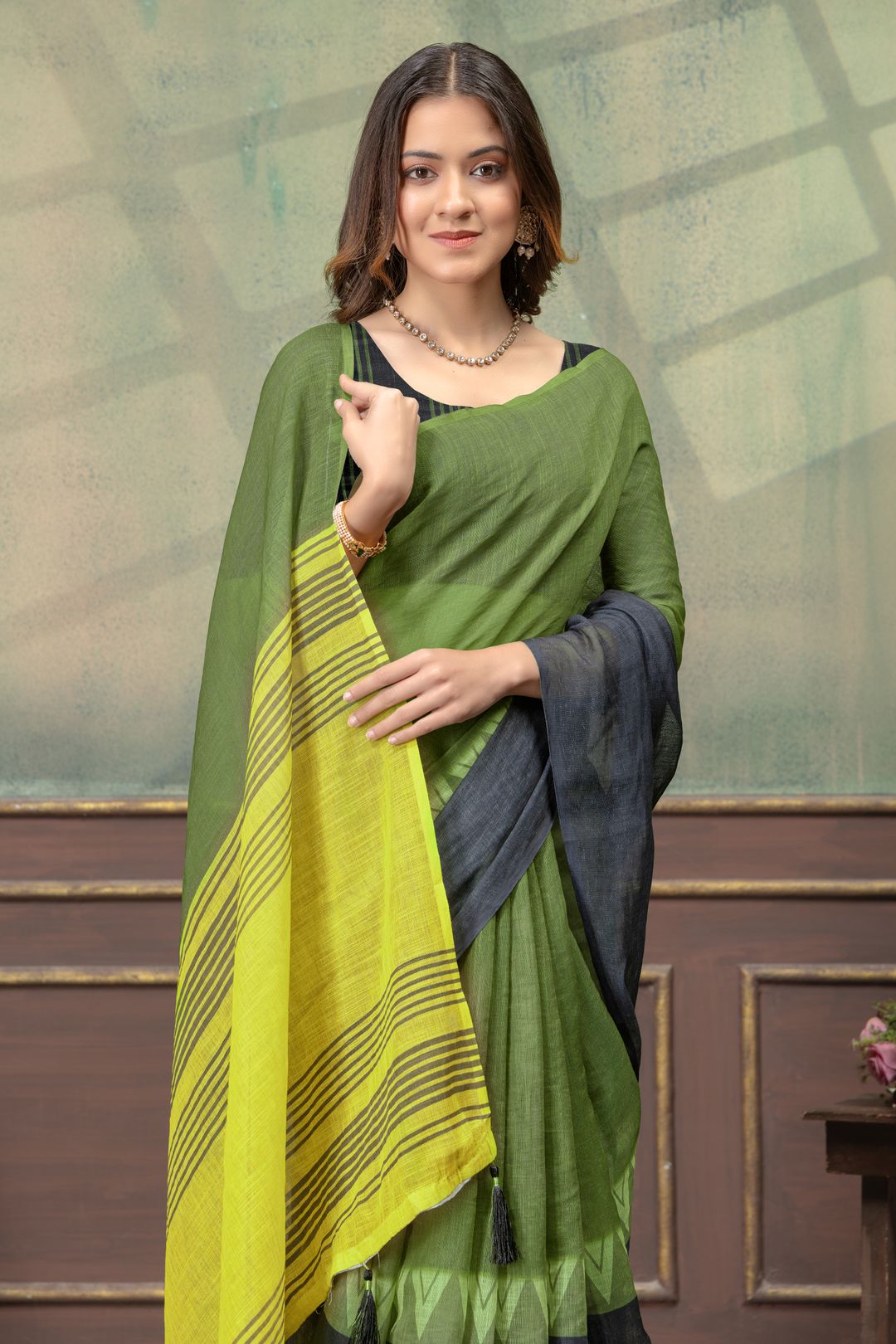 Olive Green Linen Cotton Saree with Black Yellow Pallu