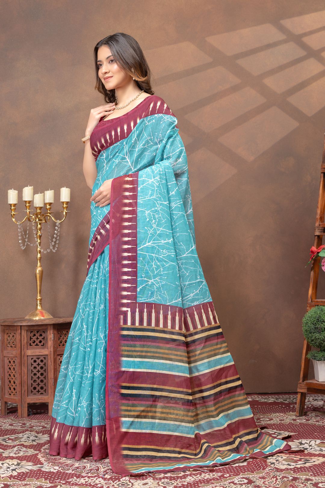Turquoise Printed Satin Saree With Maroon Striped Border