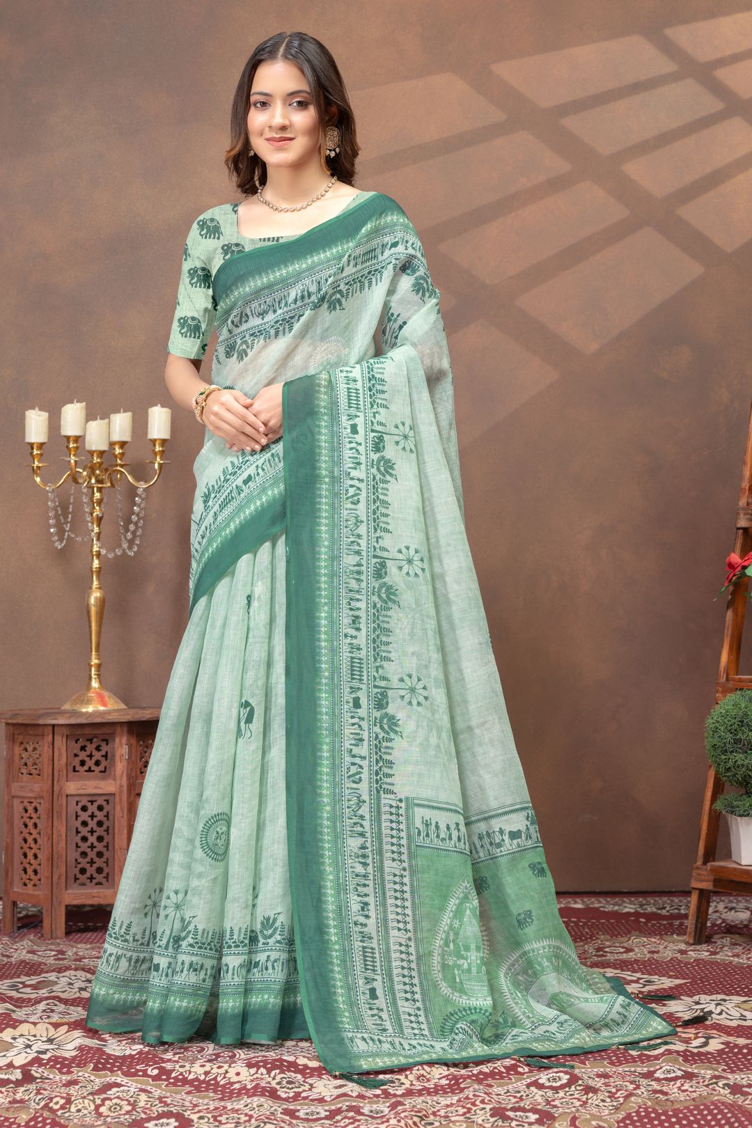 Pastel Green Folk Print Saree with Traditional Woven Border