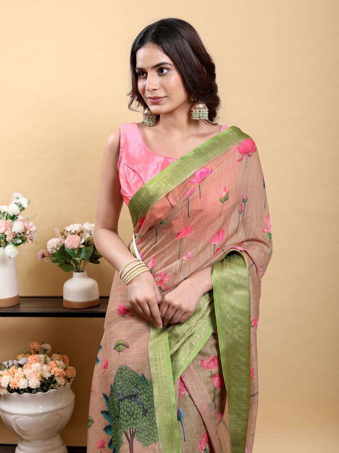 Peach Floral Linen Cotton Saree with Green Jacquard Borders