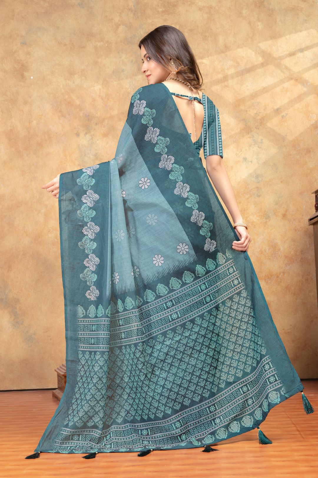 Teal Blue Floral Printed Linen Cotton Saree With Woven Border