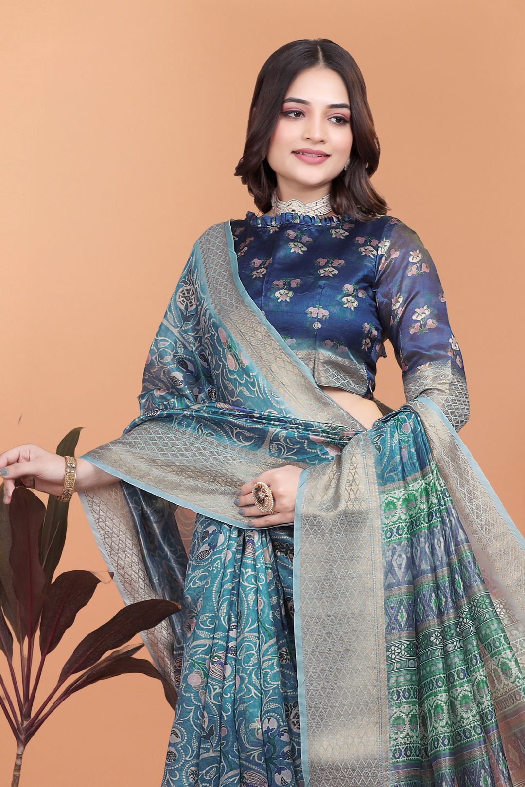 Teal Blue Floral Cotton Saree with Woven Border and Tassels